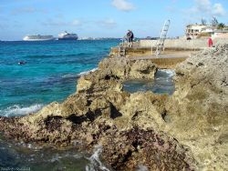 Sunset House in Grand Cayman. by Andrew Kubica 